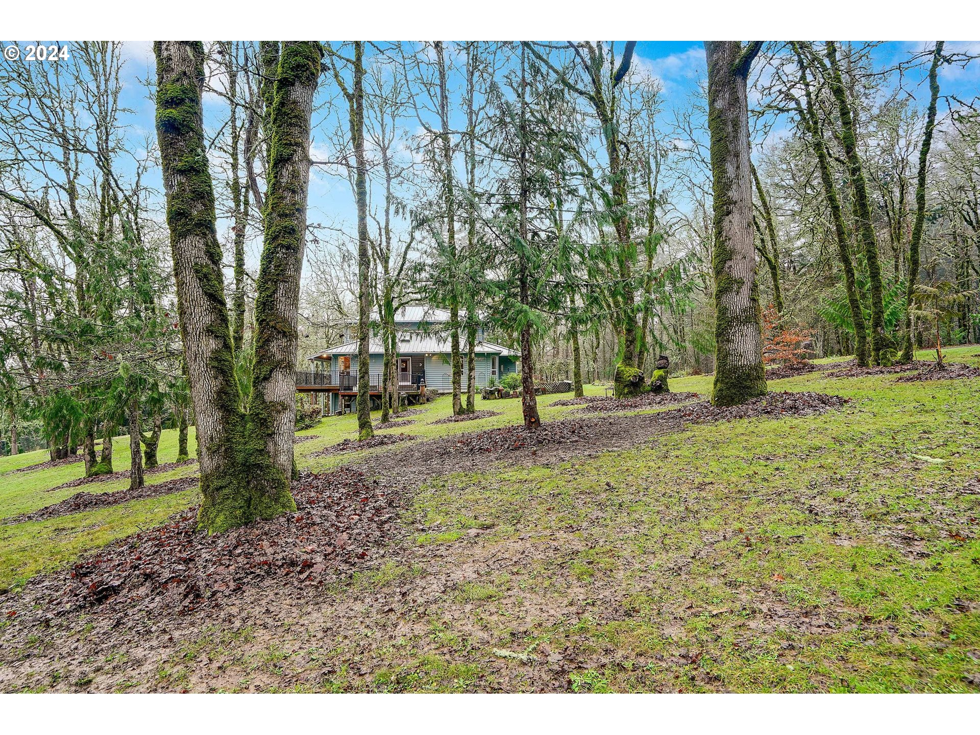 2080 Cherry Knoll Road Dallas, OR 97338 - Photo 46 of 48 a backyard of apartments with trees