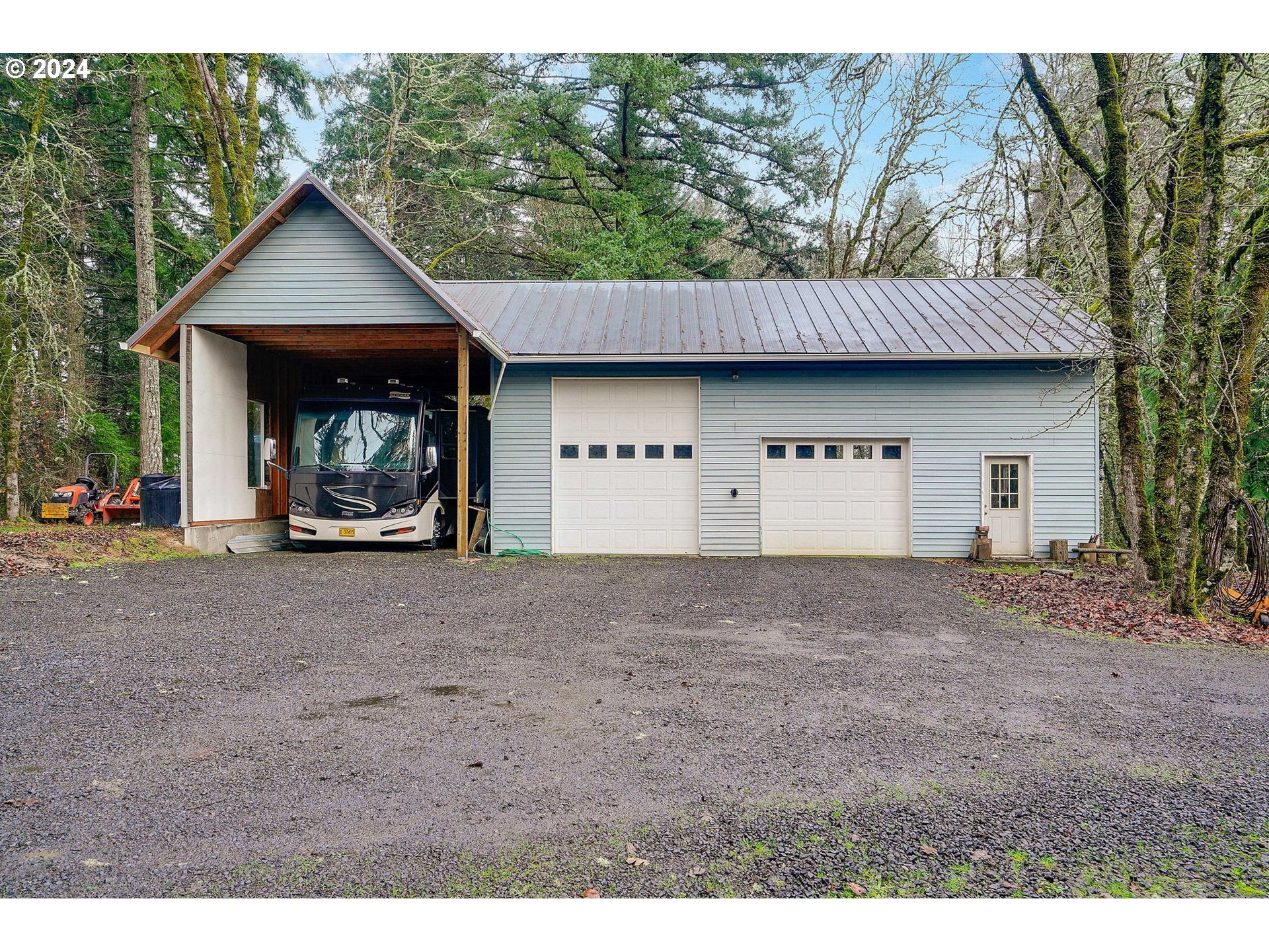 2080 Cherry Knoll Road Dallas, OR 97338 - Photo 47 of 48 a view of a house with a outdoor space and a car parked in front of it