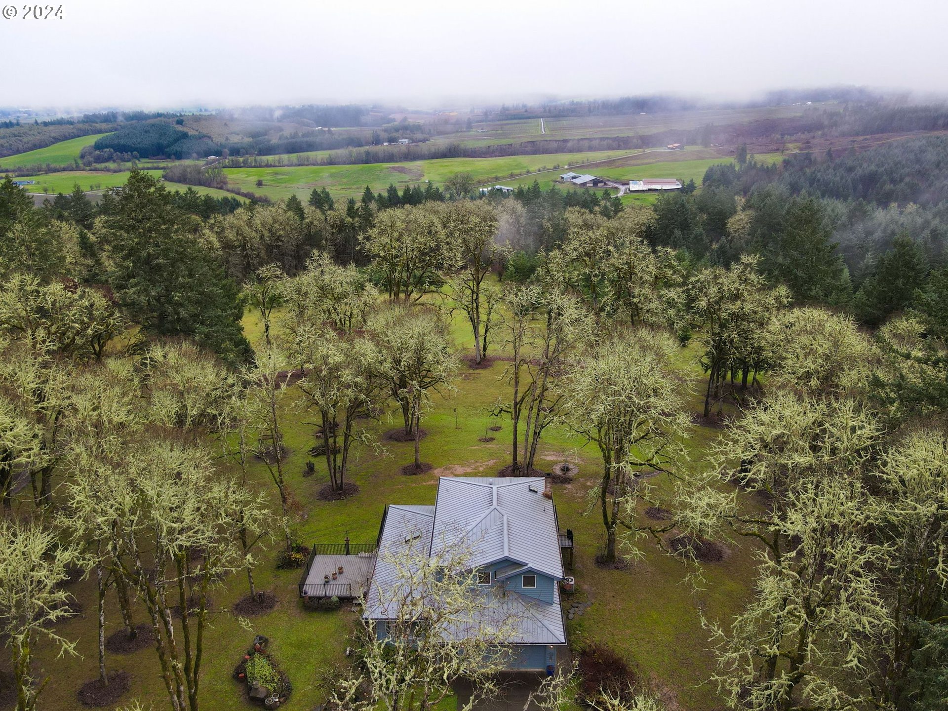 2080 Cherry Knoll Road Dallas, OR 97338 - Photo 5 of 48 an aerial view of a houses with a yard