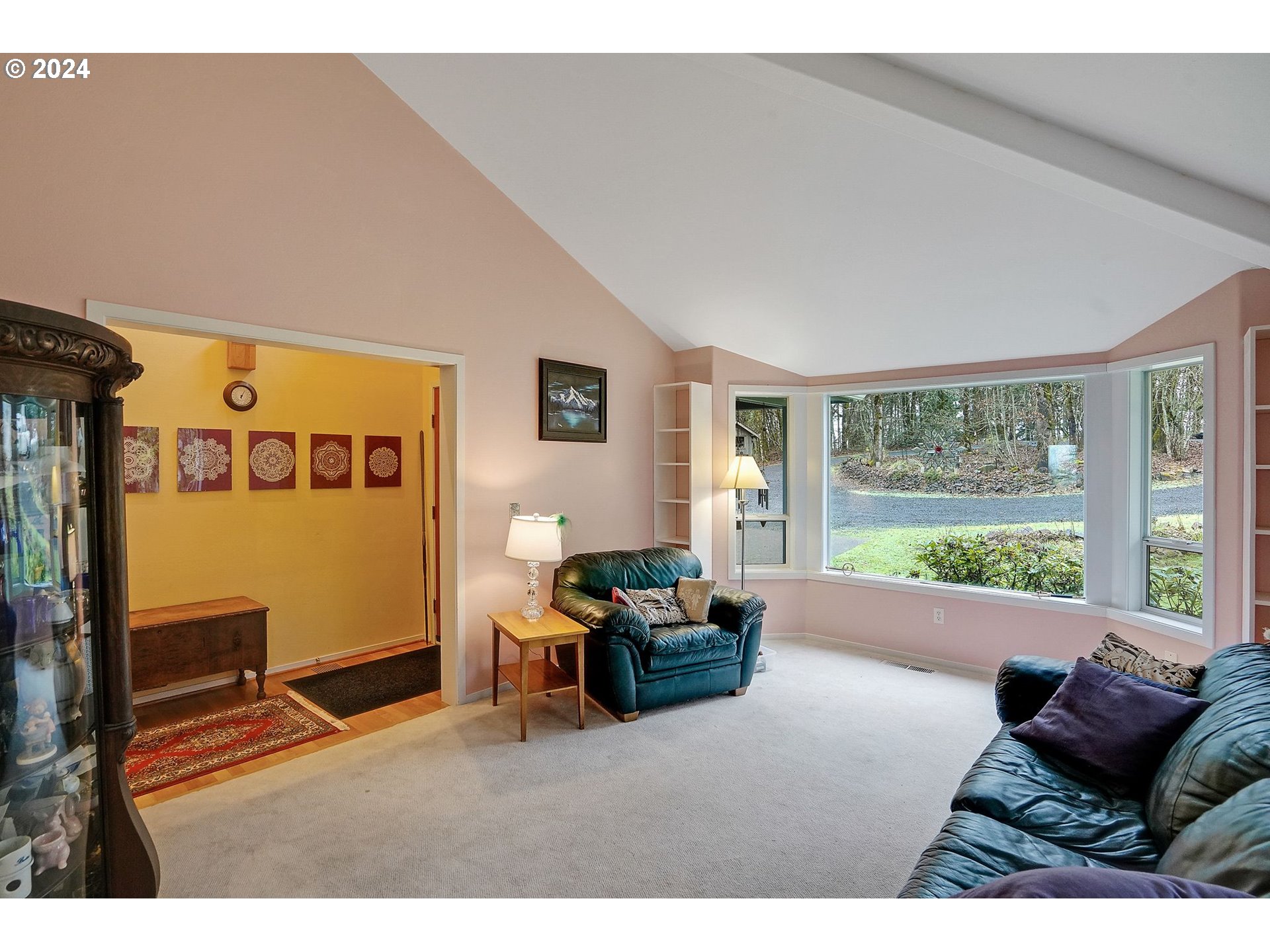 2080 Cherry Knoll Road Dallas, OR 97338 - Photo 8 of 48 a living room with furniture and windows
