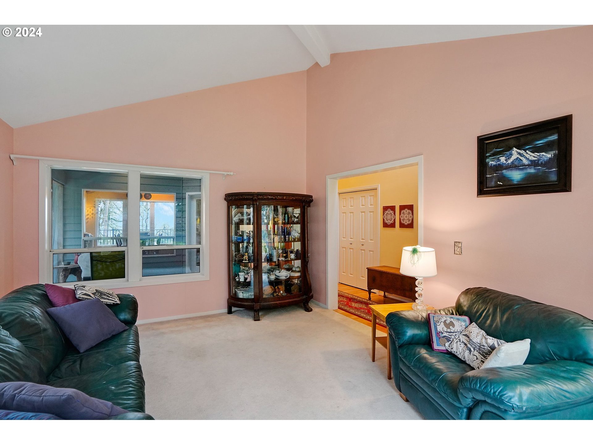 2080 Cherry Knoll Road Dallas, OR 97338 - Photo 9 of 48 a living room with furniture and a large window