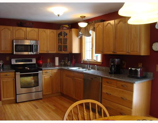 23 Robin Way Westerly, RI 02891 - Photo 3 of 12 Kitchen. Granite countertops and stainless appliances show off this spacious kitchen