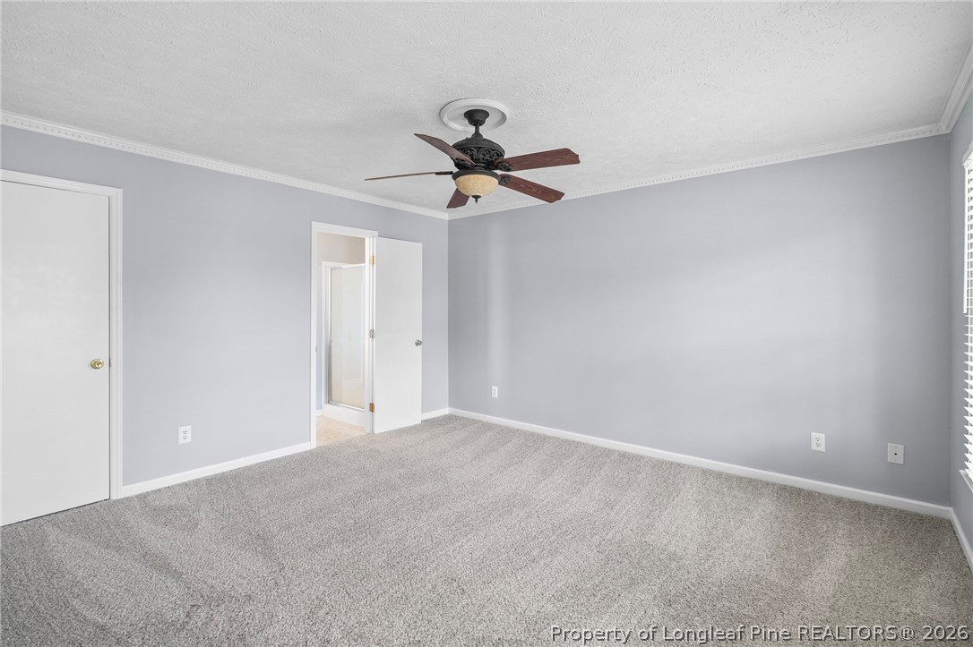 28 Coyt Circle Spring Lake, NC 28390 - Photo 18 of 41 a view of a room with a ceiling fan and a window