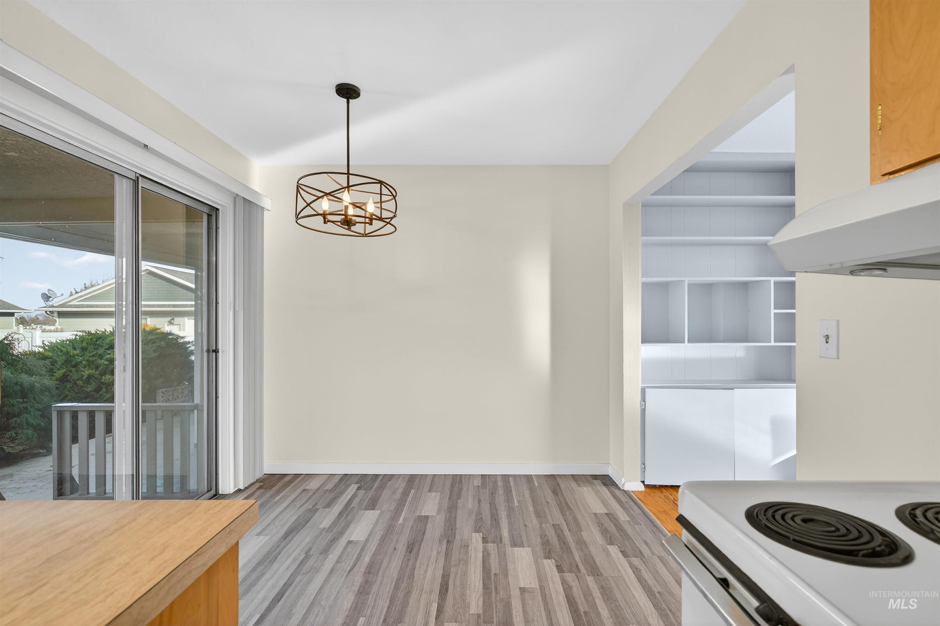 609 Grelle Avenue Lewiston, ID 83501 - Photo 11 of 48 Kitchen with light wood-type flooring and hanging lights