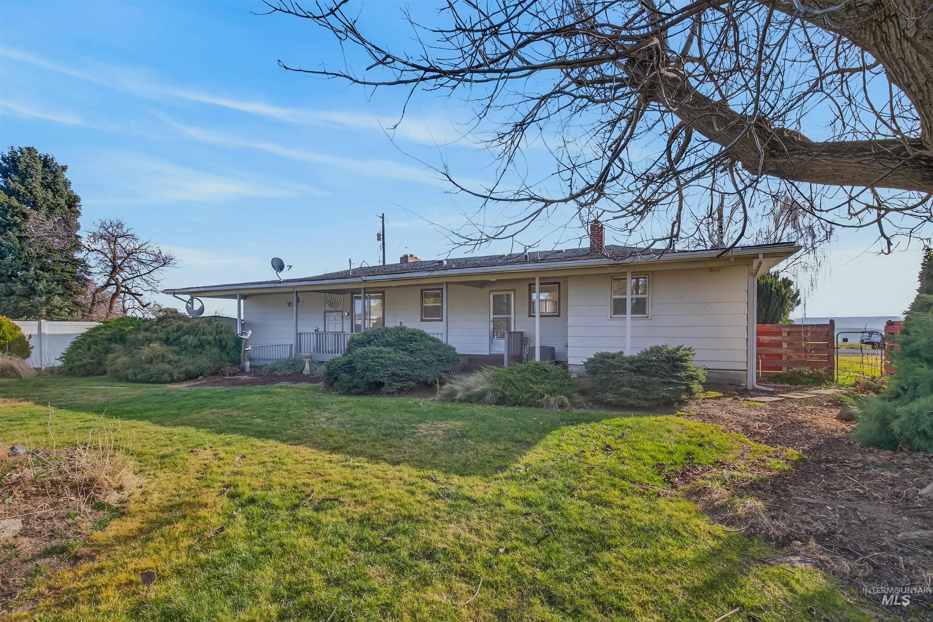 609 Grelle Avenue Lewiston, ID 83501 - Photo 46 of 48 View of front of home featuring a chimney and covered porch