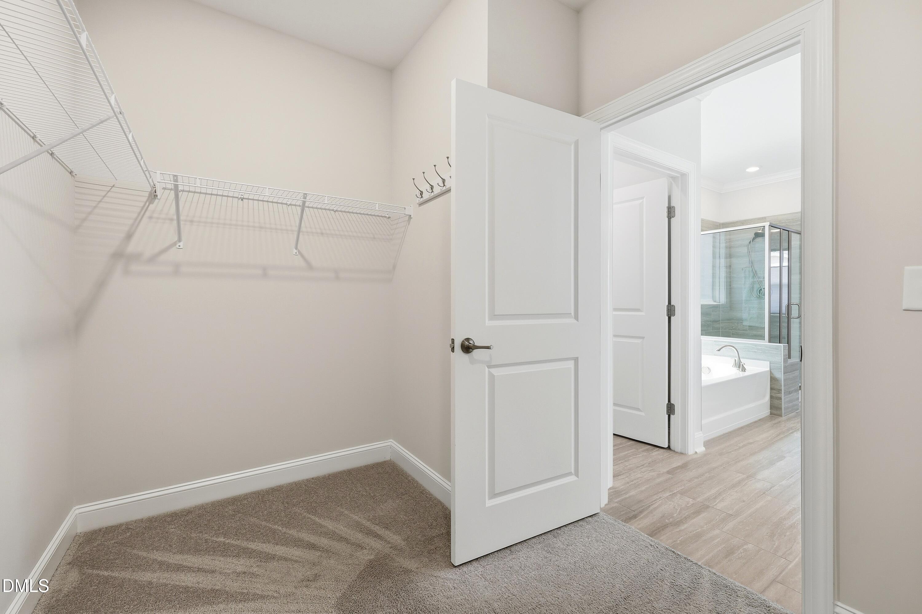 289 English Violet Lane Raleigh, NC 27610 - Photo 24 of 40 an empty room with mirror