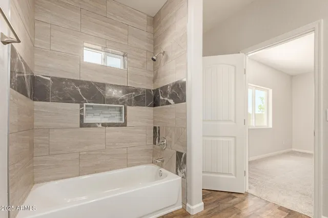 a bathroom with a bathtub