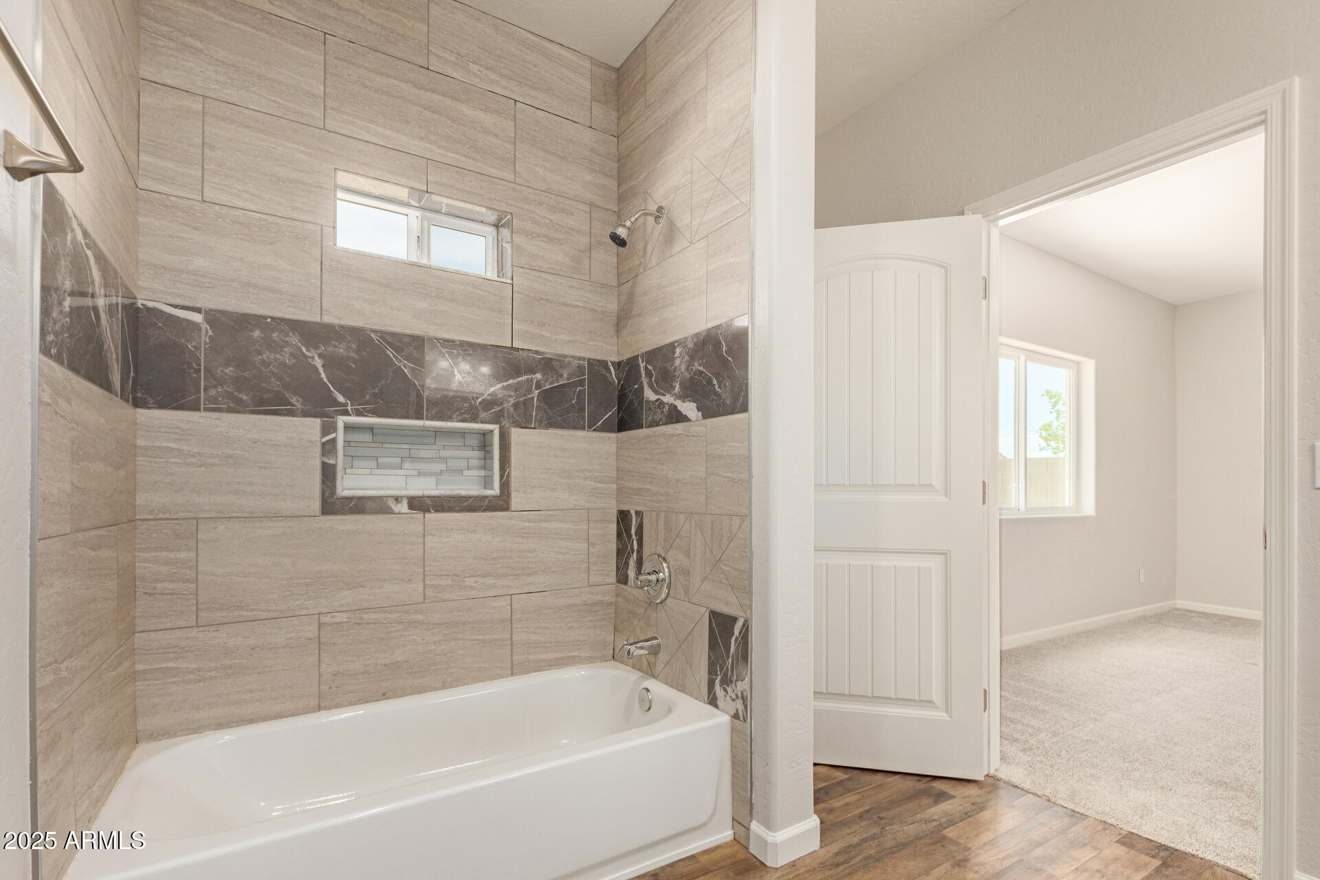 15941 South Animas Road Arizona City, AZ 85123 - Photo 15 of 26 a bathroom with a bathtub