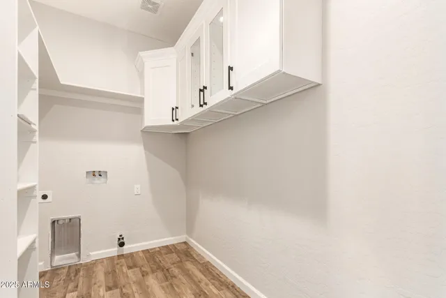 a view of a hallway with staircase