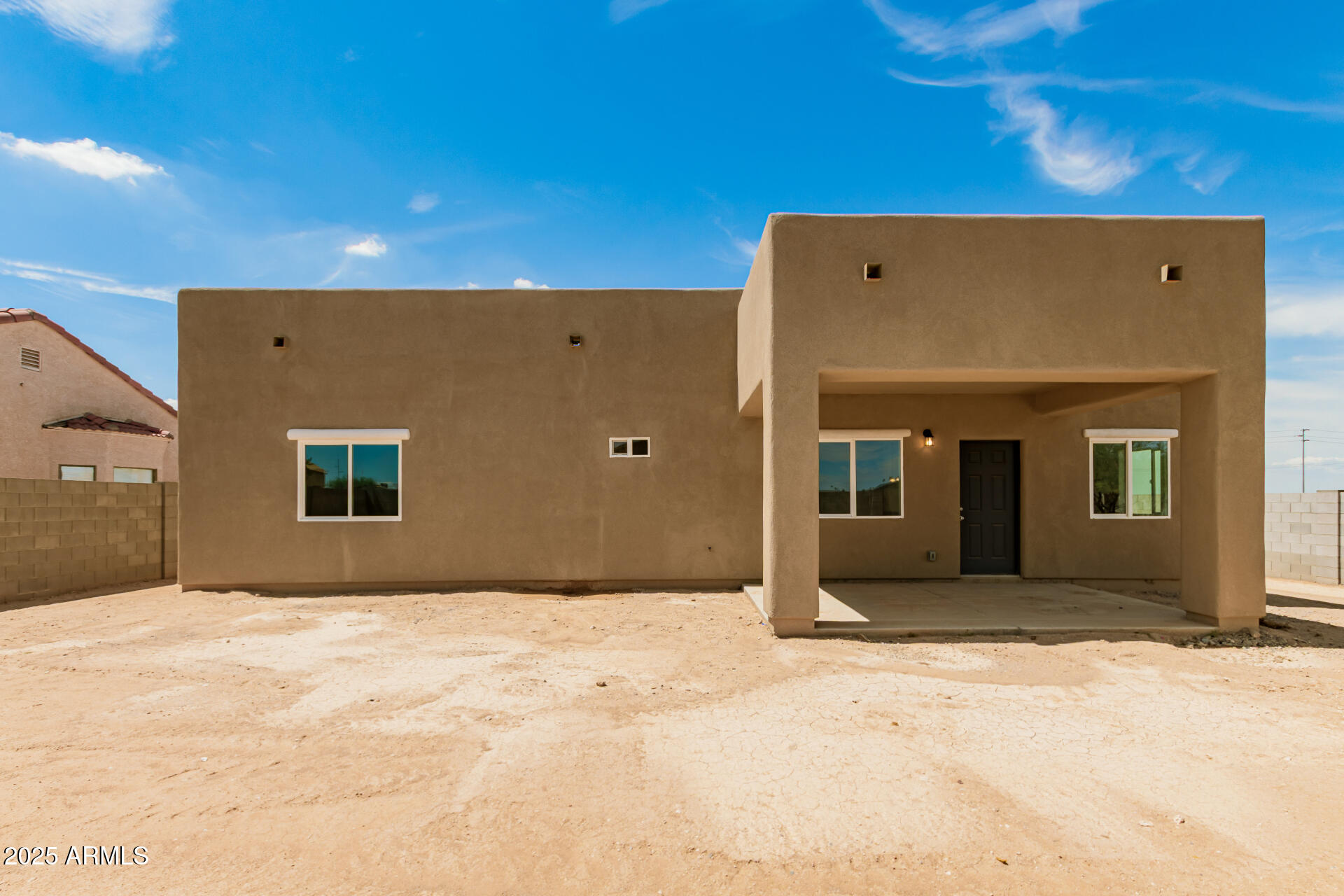 15941 South Animas Road Arizona City, AZ 85123 - Photo 25 of 26 a view of backyard of a house