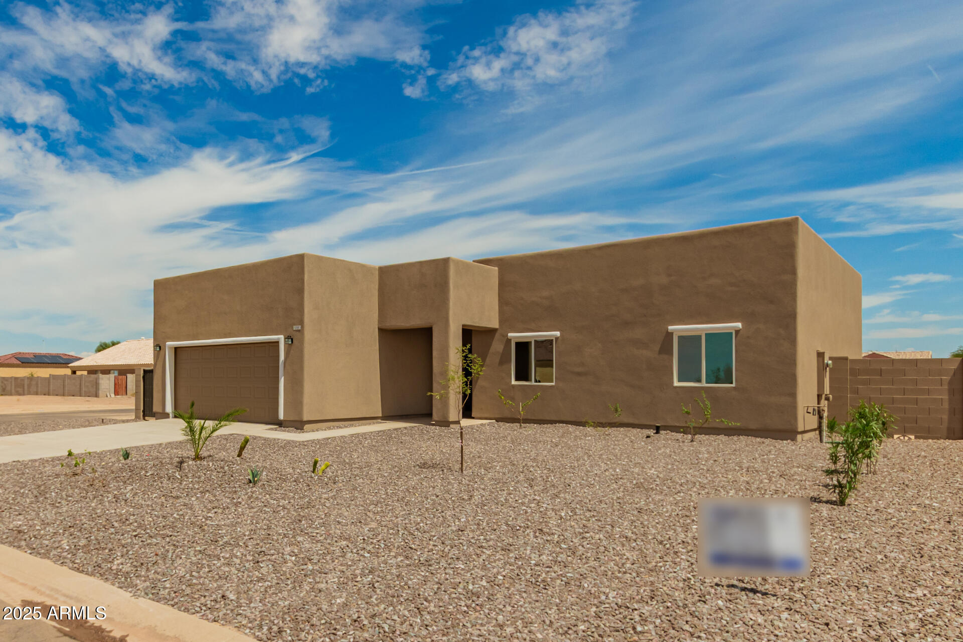 15941 South Animas Road Arizona City, AZ 85123 - Photo 3 of 26 a house view with a backyard space