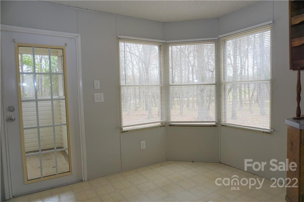 1293 Hines Road Clover, SC 29710 - Photo 11 of 33 a view of an empty room with a window