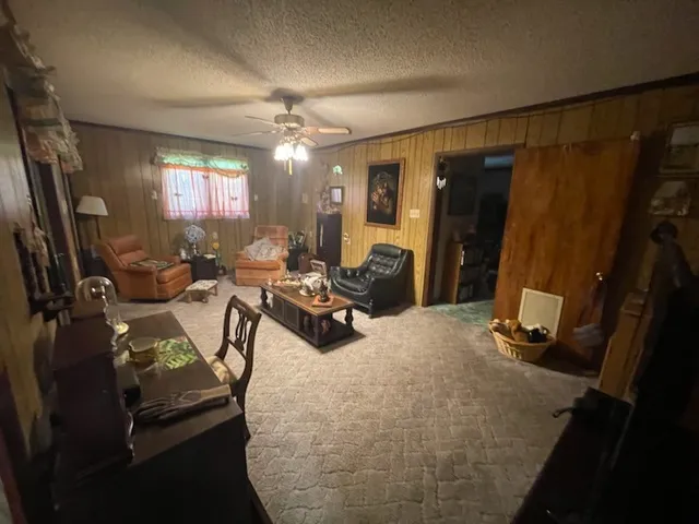 a room with gym equipment and a large mirror