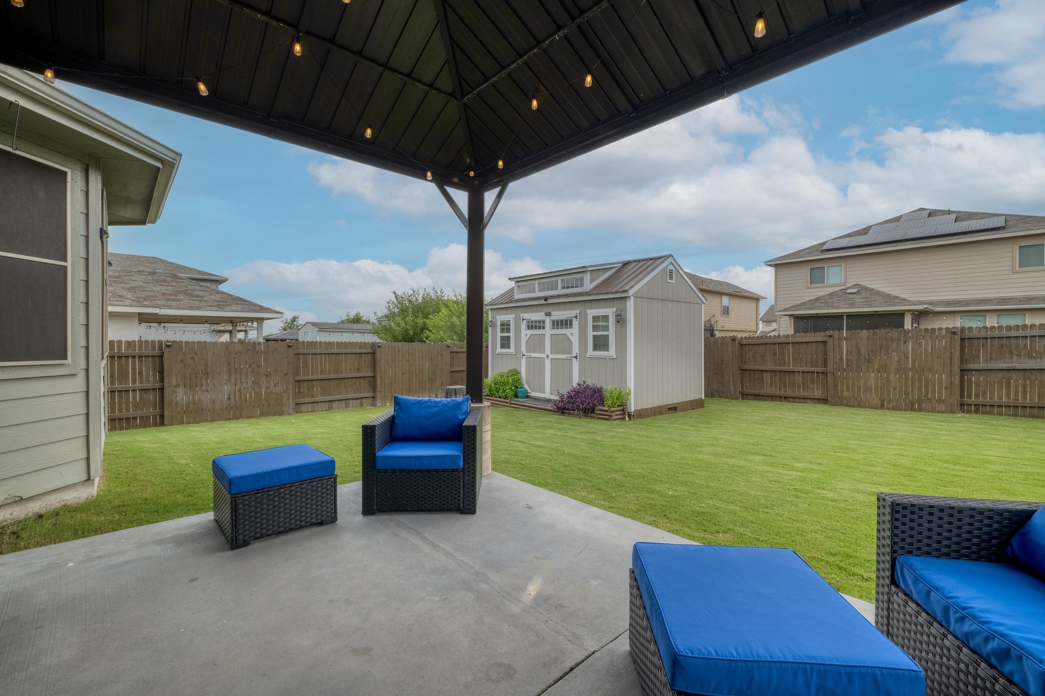 19028 Quebrada Drive Pflugerville, TX 78660 - Photo 25 of 36 a view of a porch with furniture and a yard