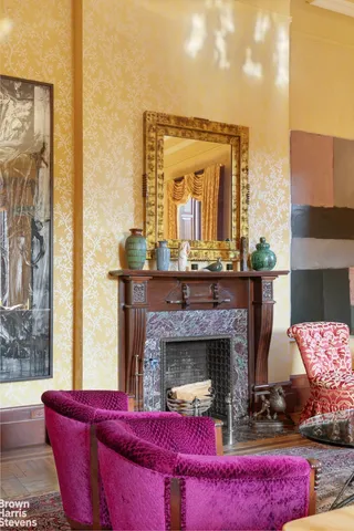 a very nice looking living room with a large window