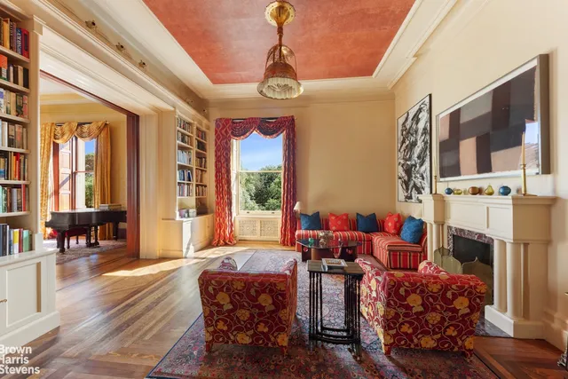 a view of a livingroom with furniture and a chandelier