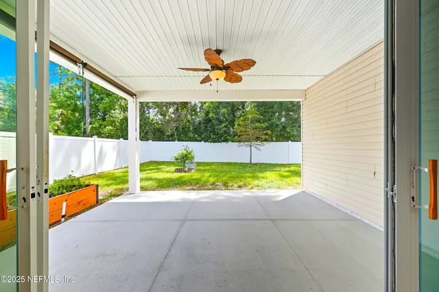 a view of swimming pool with a backyard