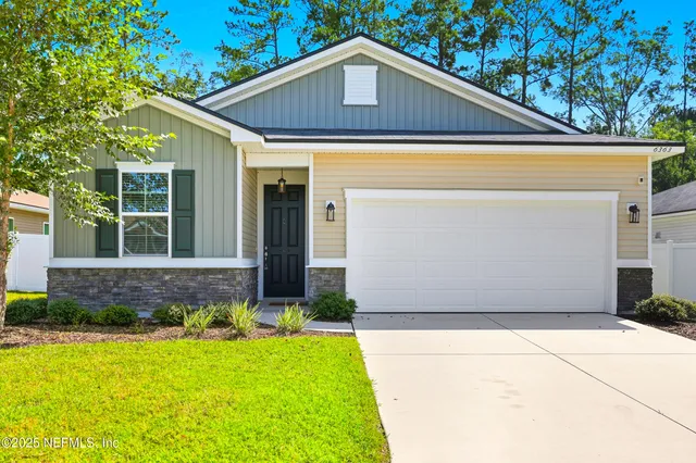 a front view of house with yard