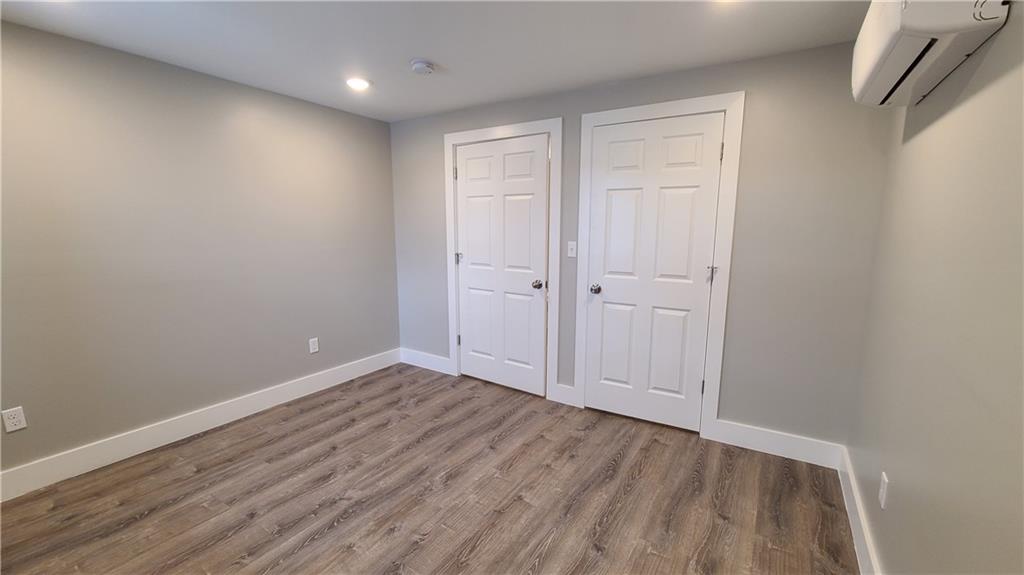 1331 Freeport Road Cheswick, PA 15024 - Photo 26 of 32 a view of an empty room with wooden floor
