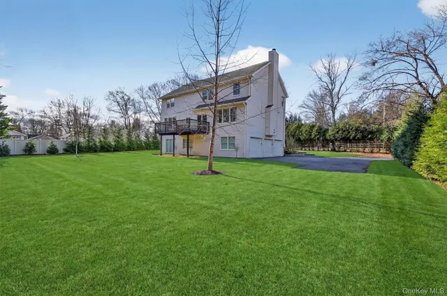 a house that is sitting in the grass