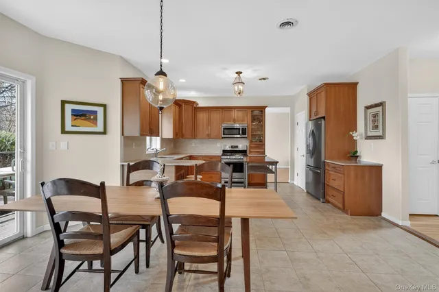 a view of a dining room kitchen and a window