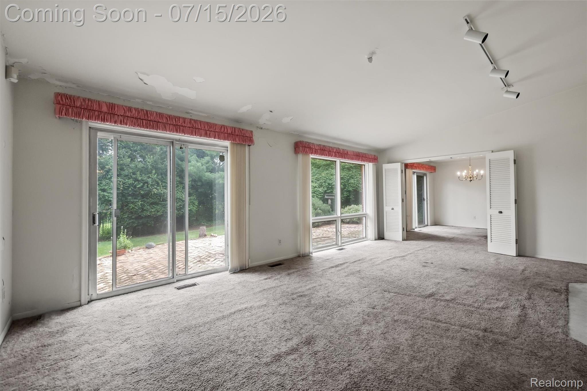 1151 Peveril Road Bloomfield Hills, MI 48304 - Photo 9 of 39 View of family room leading into the dining room
