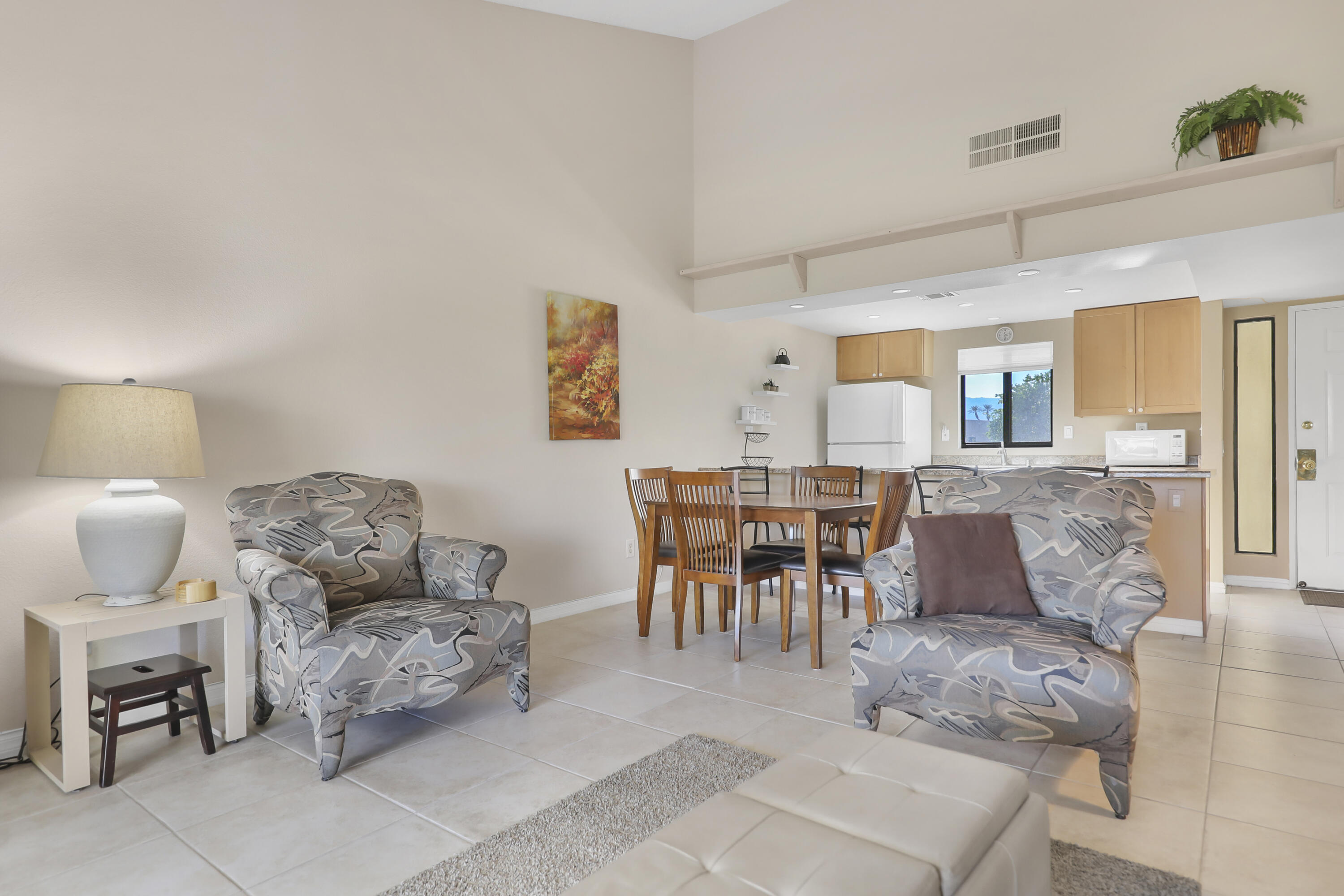 41476 Inverness Way Palm Desert, CA 92211 - Photo 11 of 37 a living room with furniture and wooden floor