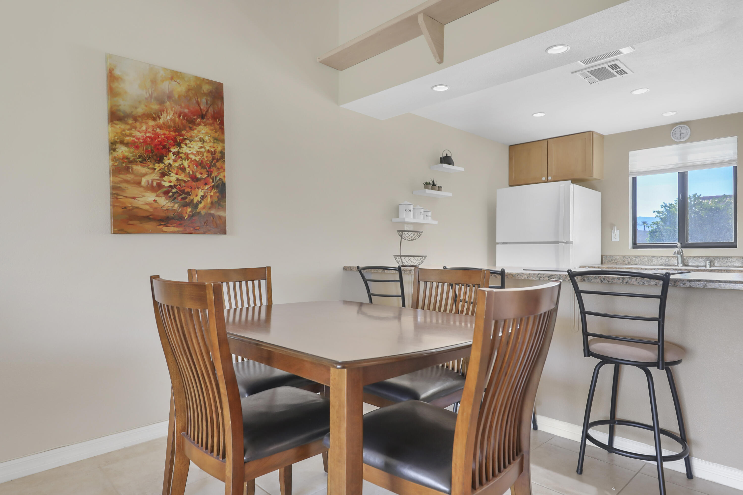 41476 Inverness Way Palm Desert, CA 92211 - Photo 12 of 37 a view of a dining room with furniture