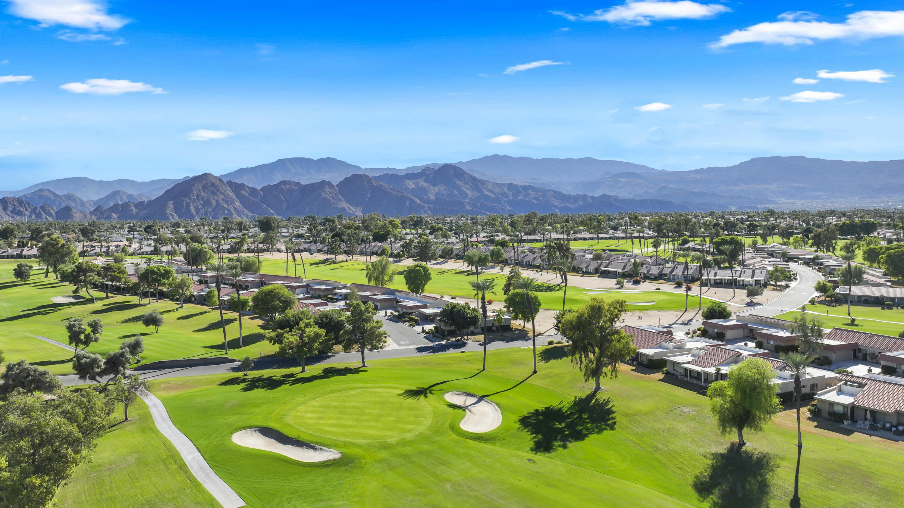 41476 Inverness Way Palm Desert, CA 92211 - Photo 22 of 37 a view of a city with mountains in the background