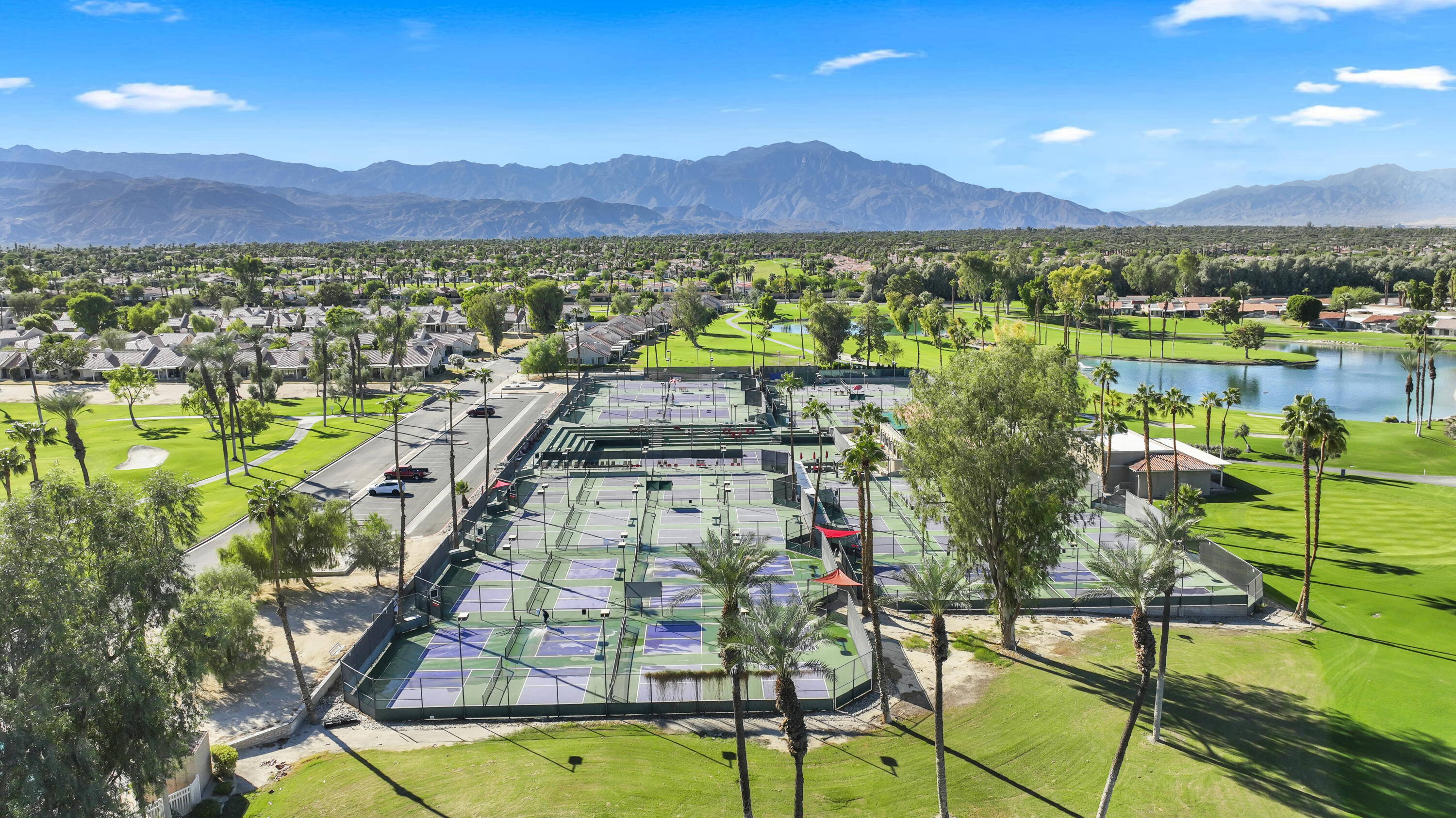 41476 Inverness Way Palm Desert, CA 92211 - Photo 23 of 37 a view of lake and mountain with outdoor space