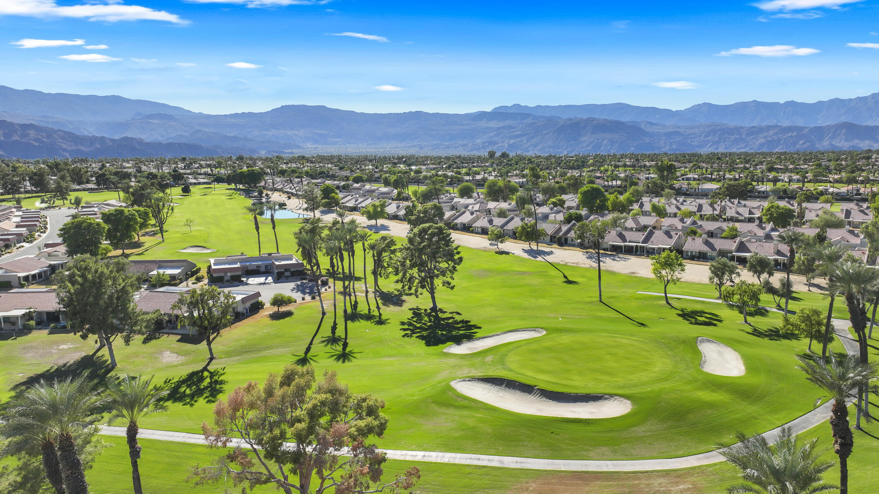 41476 Inverness Way Palm Desert, CA 92211 - Photo 24 of 37 a view of a city with mountains in the background