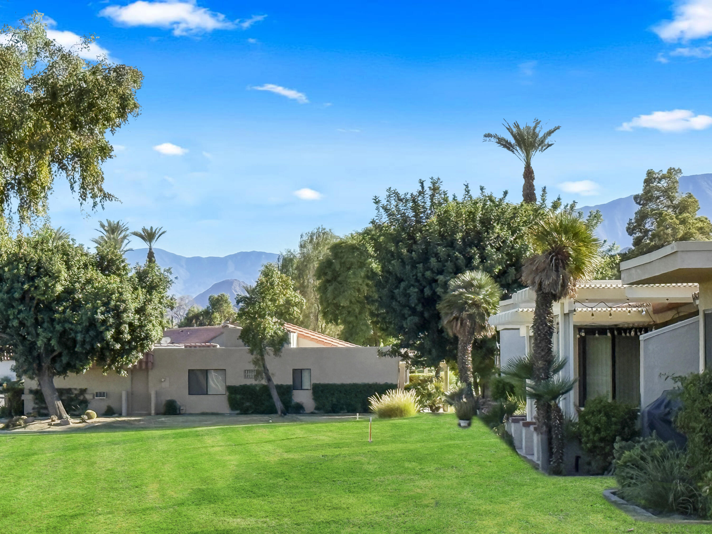 41476 Inverness Way Palm Desert, CA 92211 - Photo 29 of 37 a front view of a house with garden