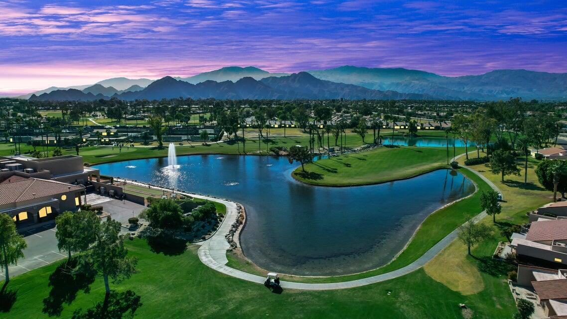 41476 Inverness Way Palm Desert, CA 92211 - Photo 33 of 37 a view of a lake with a mountain
