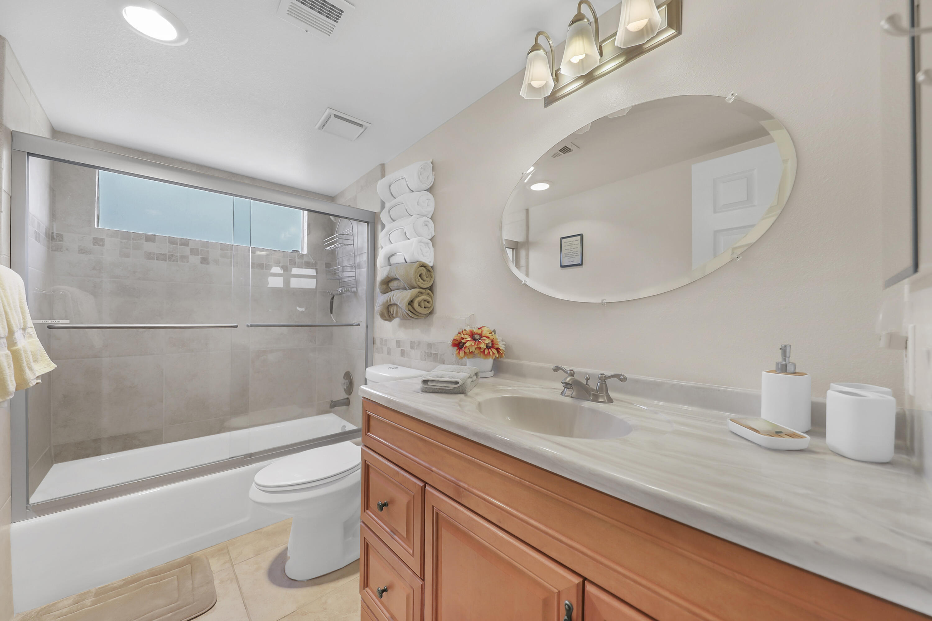 41476 Inverness Way Palm Desert, CA 92211 - Photo 5 of 37 a bathroom with a sink a toilet and shower
