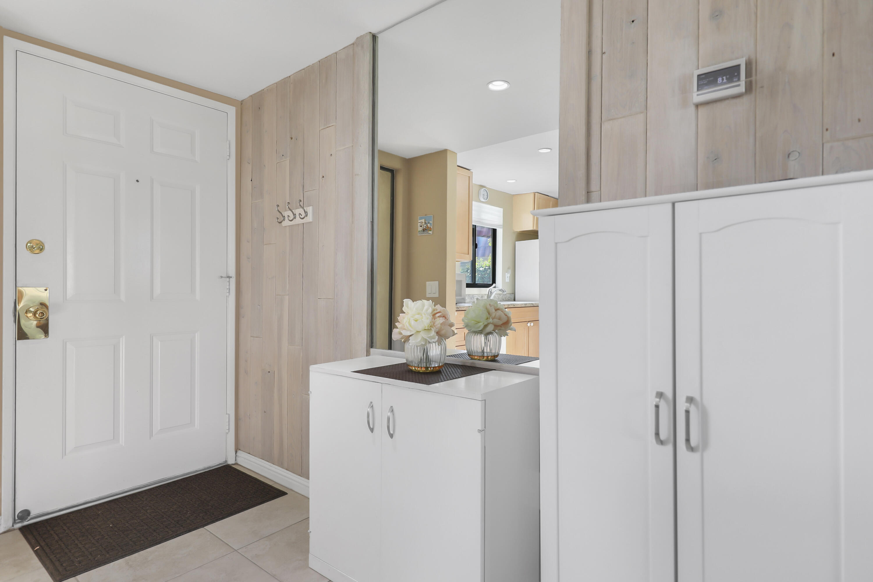 41476 Inverness Way Palm Desert, CA 92211 - Photo 8 of 37 a bathroom with a sink a mirror and a shower