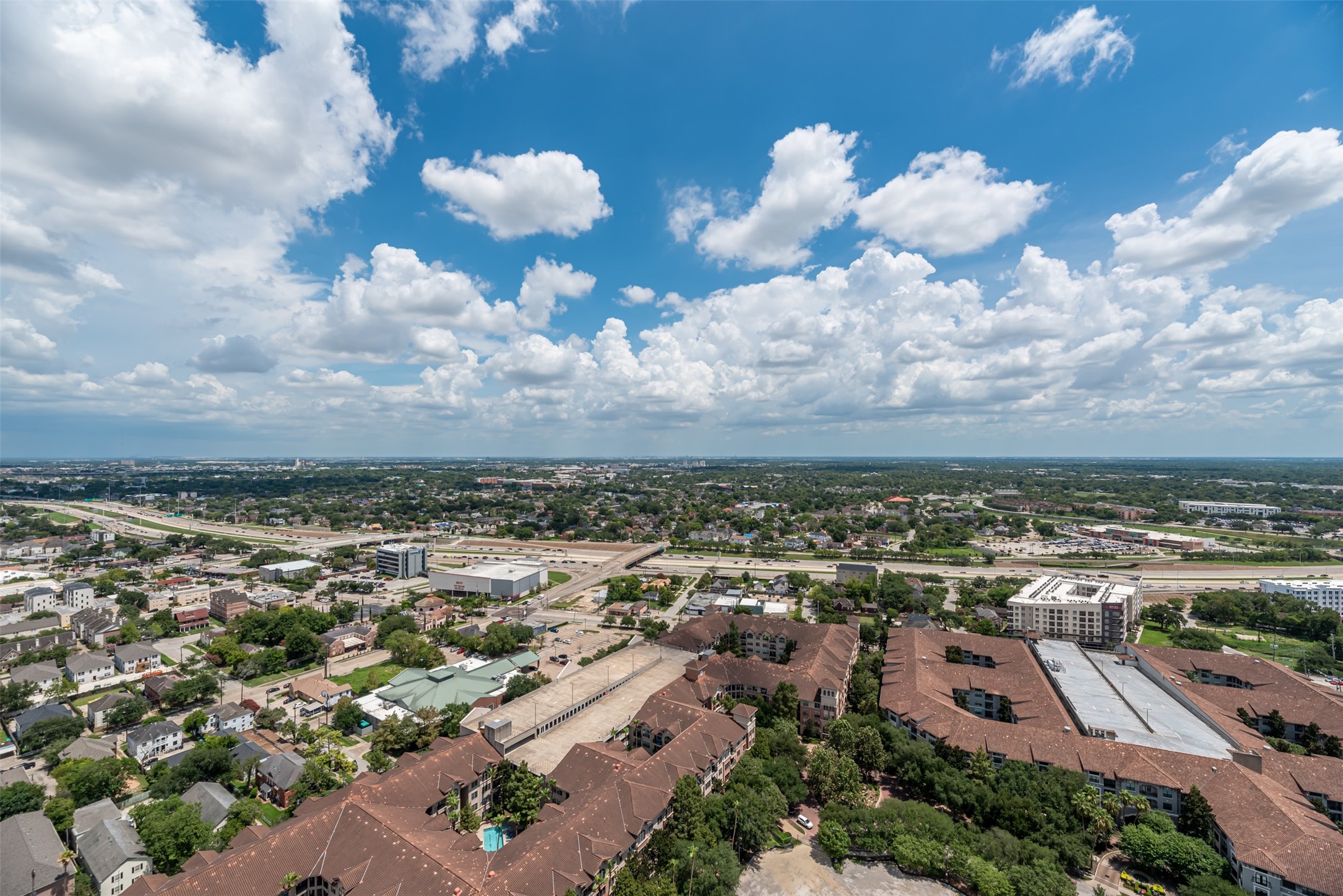 1701 Hermann Drive, Unit 34L Houston, TX 77004 - Photo 18 of 37 Blues skies and cotton clouds always welcome.
