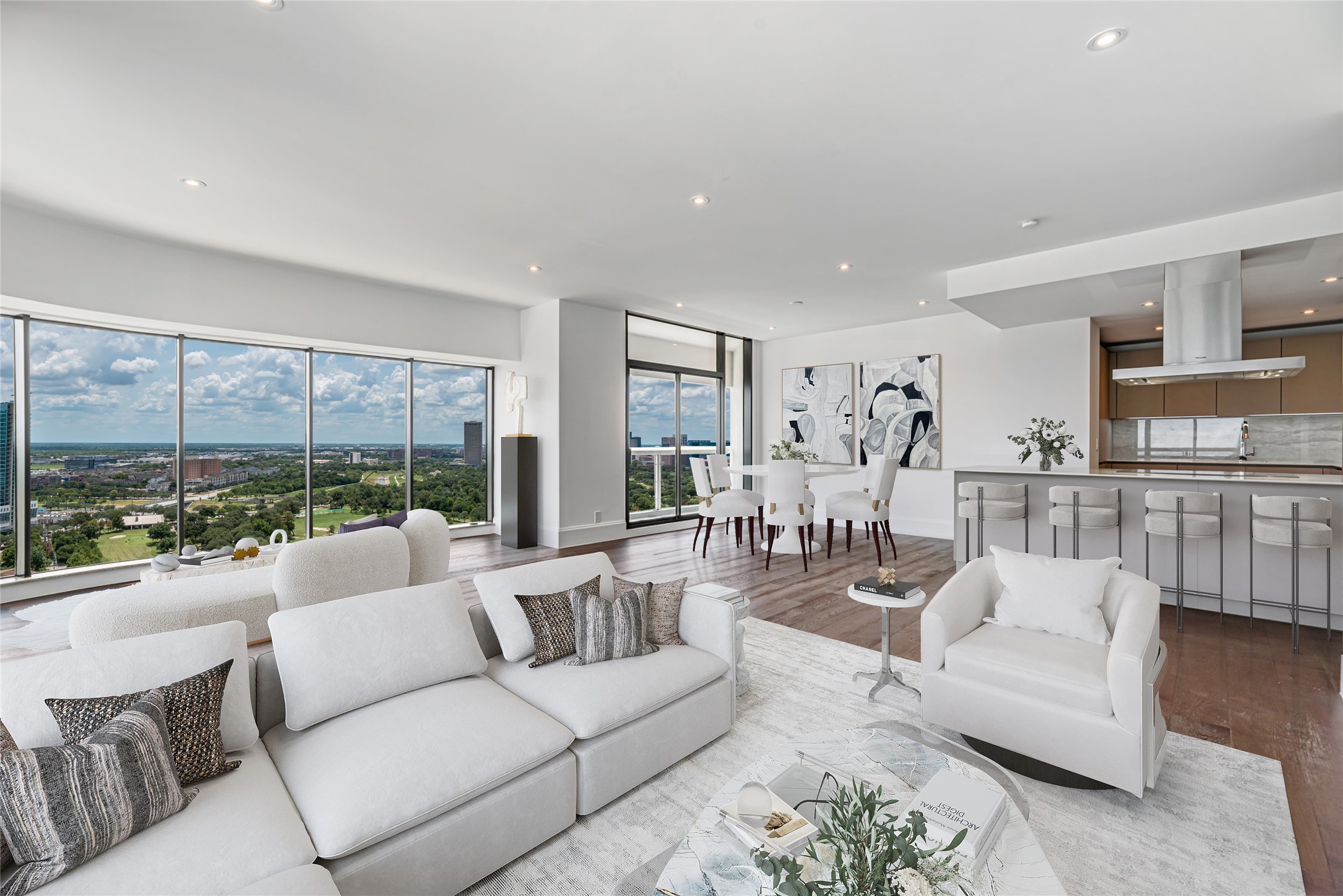 1701 Hermann Drive, Unit 34L Houston, TX 77004 - Photo 2 of 37 Formal dining and a sleek island kitchen offer ideal flow for entertaining. Virtually staged photo.
