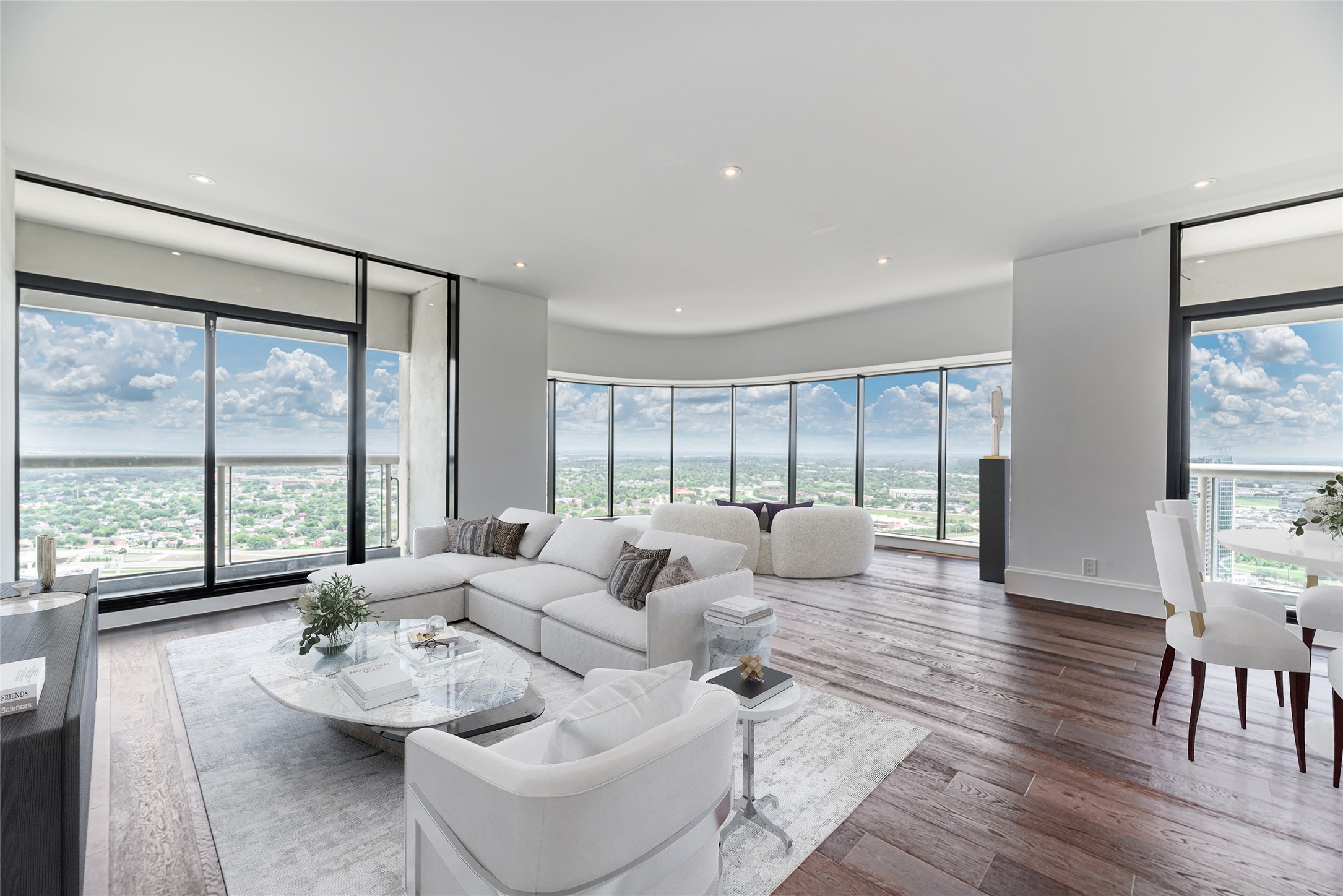 1701 Hermann Drive, Unit 34L Houston, TX 77004 - Photo 3 of 37 Open concept affords multiple living areas while the walls of windows bring in tons of natural light. Virtually staged photo.