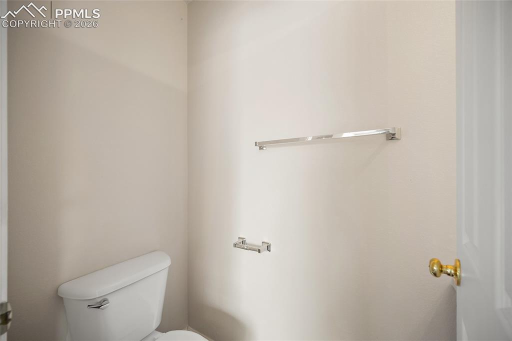 4400 Rawhide Road, Unit 157 Pueblo, CO 81008 - Photo 13 of 36 a white toilet sitting next to a shower