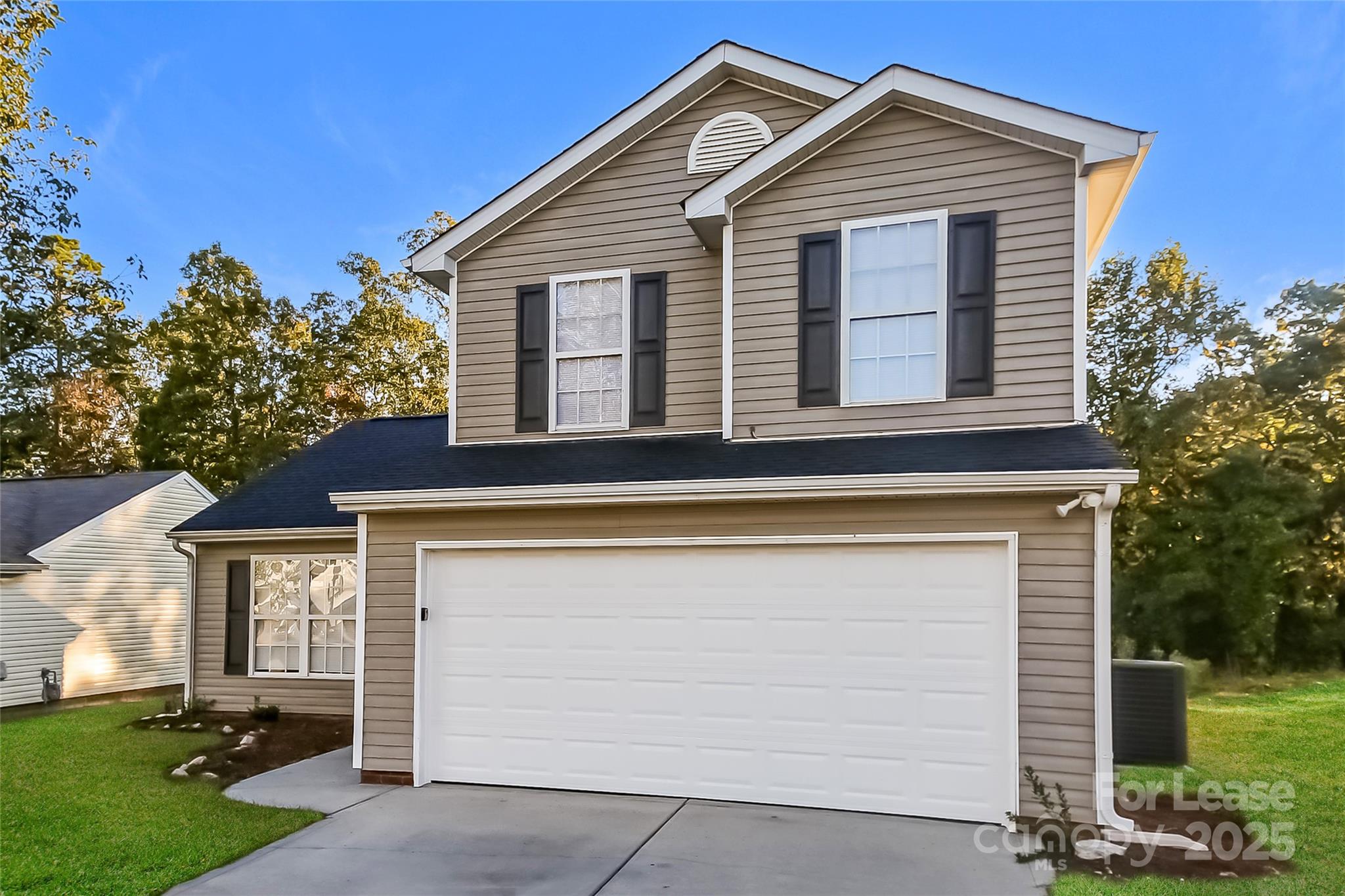 887 Anchor Way Northeast Kannapolis, NC 28083 - Photo 1 of 17 a front view of a house with a yard and garage
