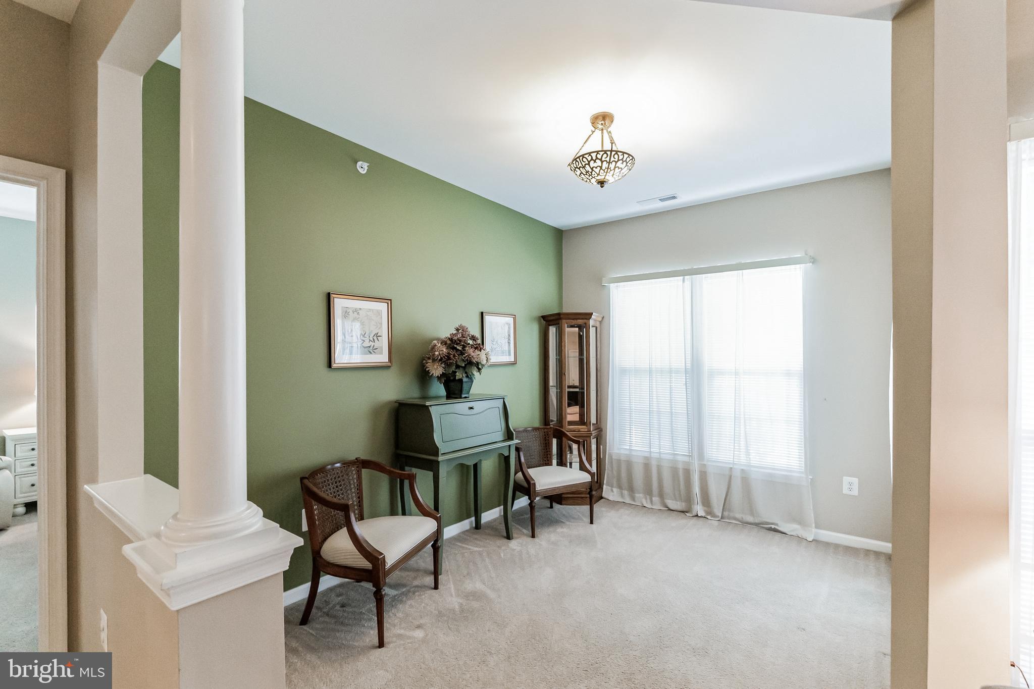 200 Beech Boulevard, Unit 104 Warrington, PA 18976 - Photo 18 of 30 a view of a livingroom with furniture and a window