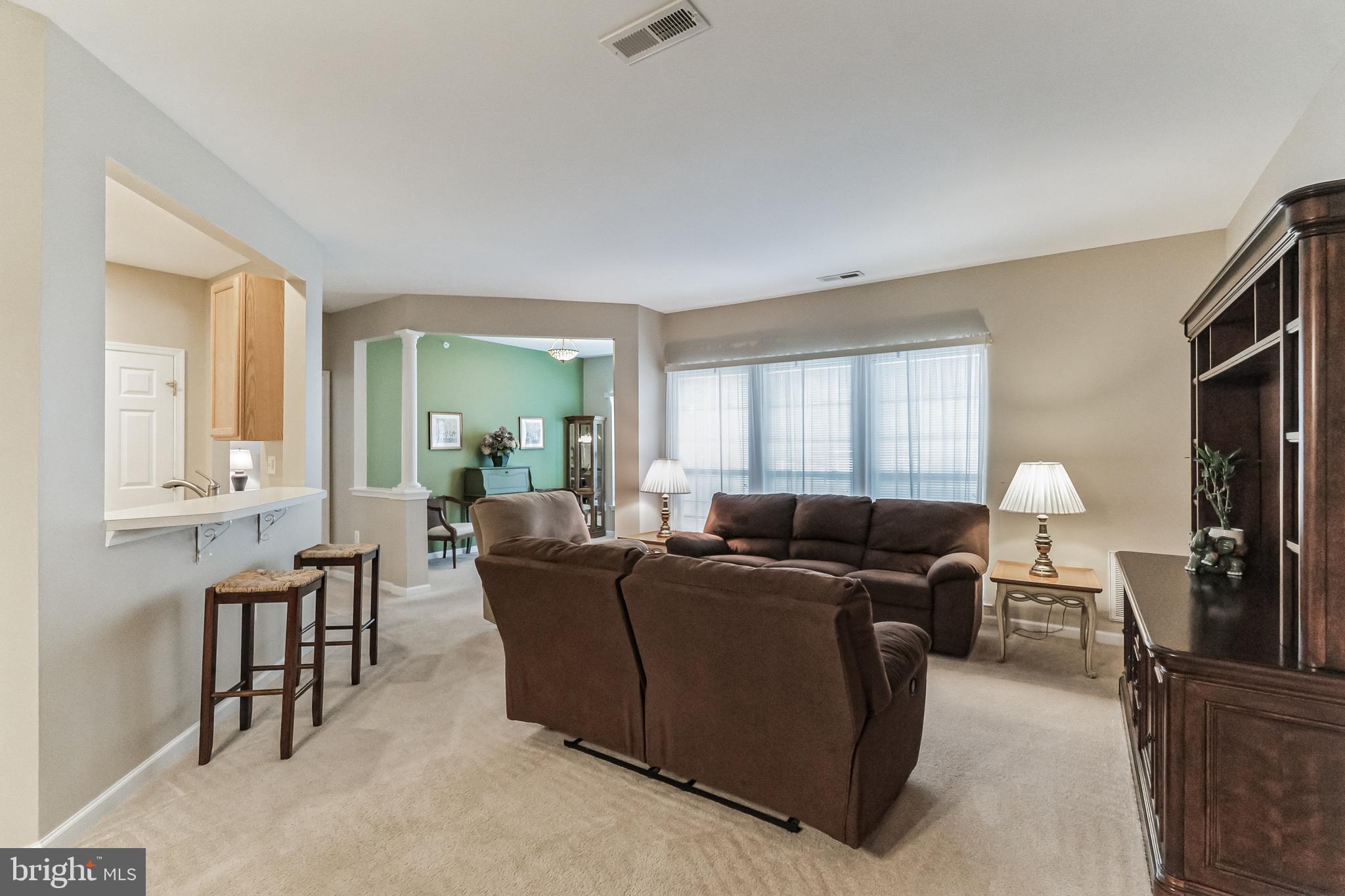 200 Beech Boulevard, Unit 104 Warrington, PA 18976 - Photo 9 of 30 a living room with furniture and a window