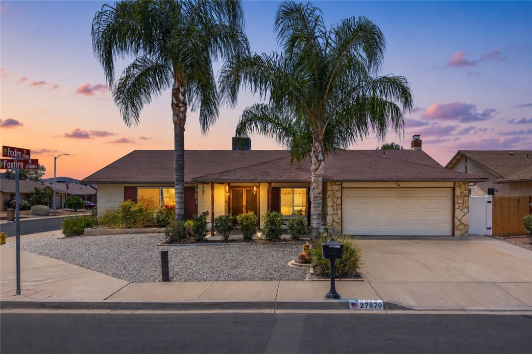 27879 Foxfire Street Menifee, CA 92586 - Photo 1 of 36 a front view of house with yard and green space