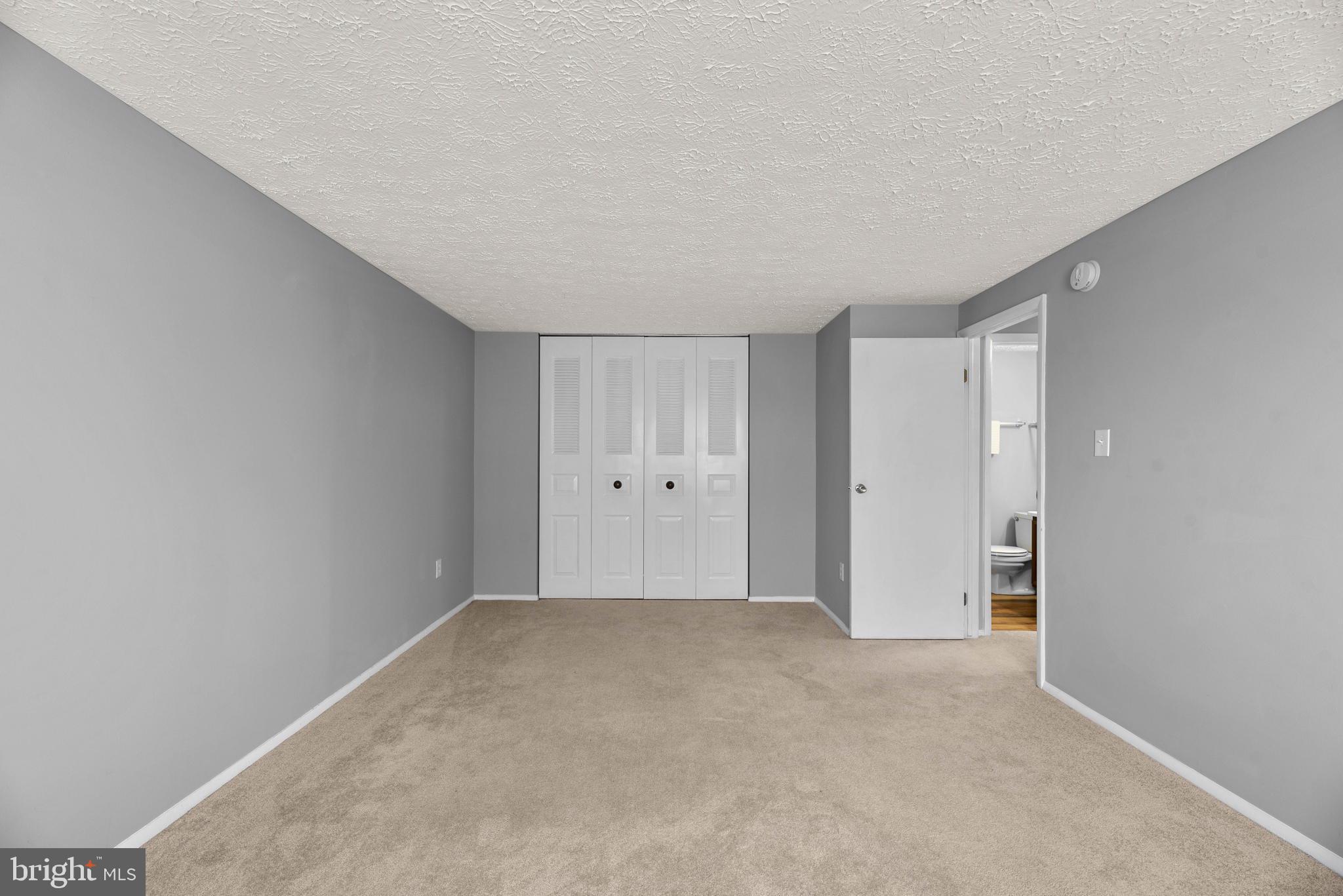999 Heather Ridge Drive, Unit 2G Frederick, MD 21702 - Photo 18 of 31 Primary Bedroom