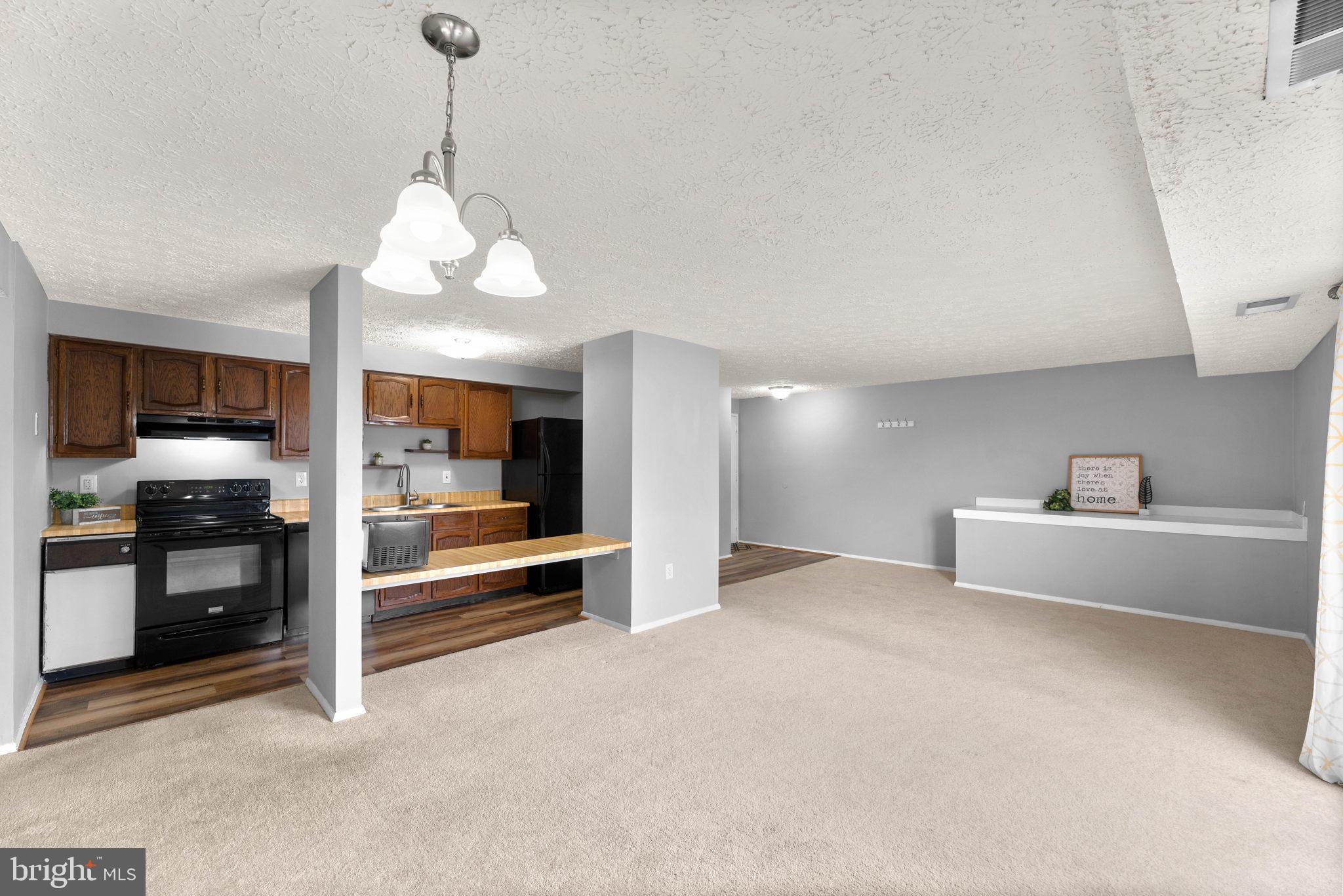 999 Heather Ridge Drive, Unit 2G Frederick, MD 21702 - Photo 8 of 31 Living / Dining Room Combo