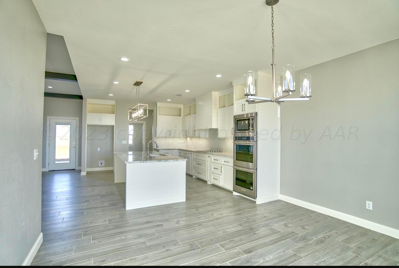 3651 Whitetail Springs Road Amarillo, TX 79119 - Photo 8 of 32 Dining to Kitchen