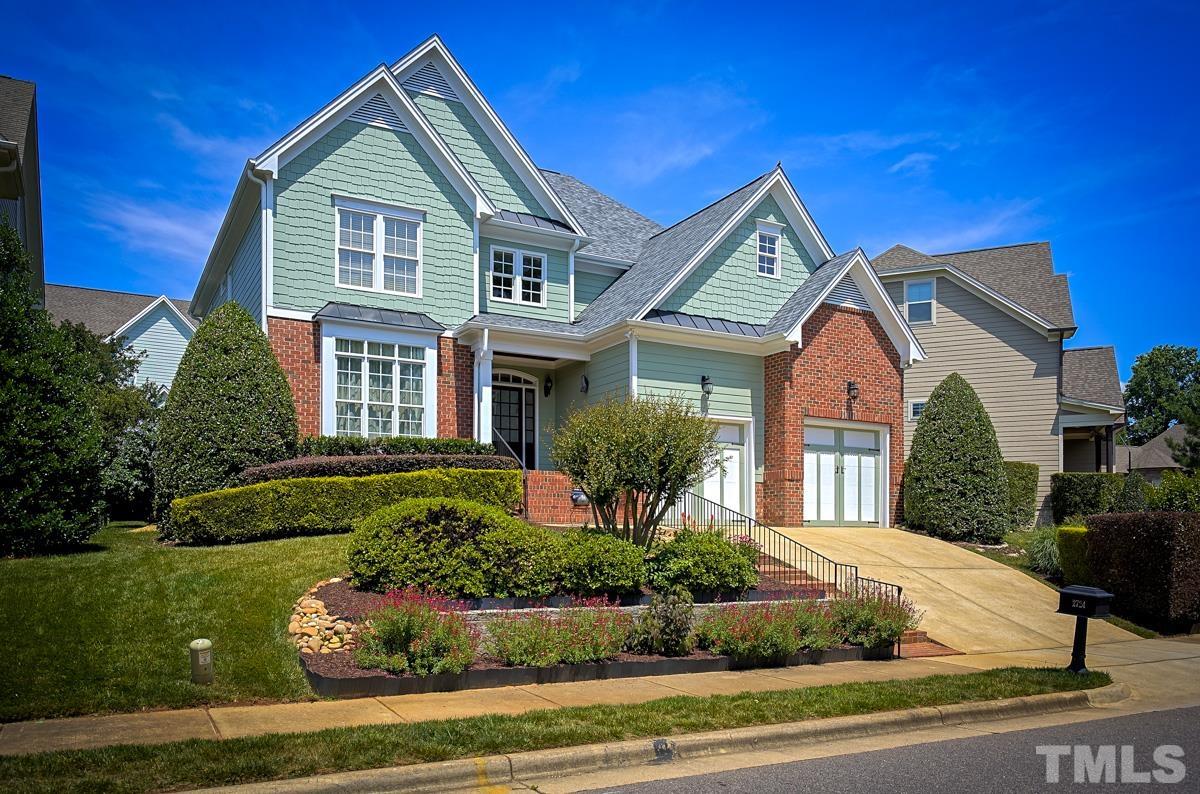 2724 Peachleaf Street Raleigh, NC 27614 - Photo 1 of 45 a front view of a house with a yard