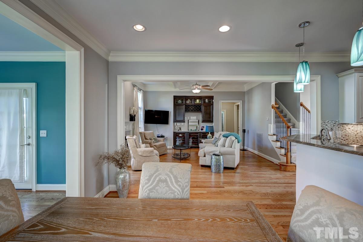 2724 Peachleaf Street Raleigh, NC 27614 - Photo 11 of 45 a living room with furniture and view of kitchen