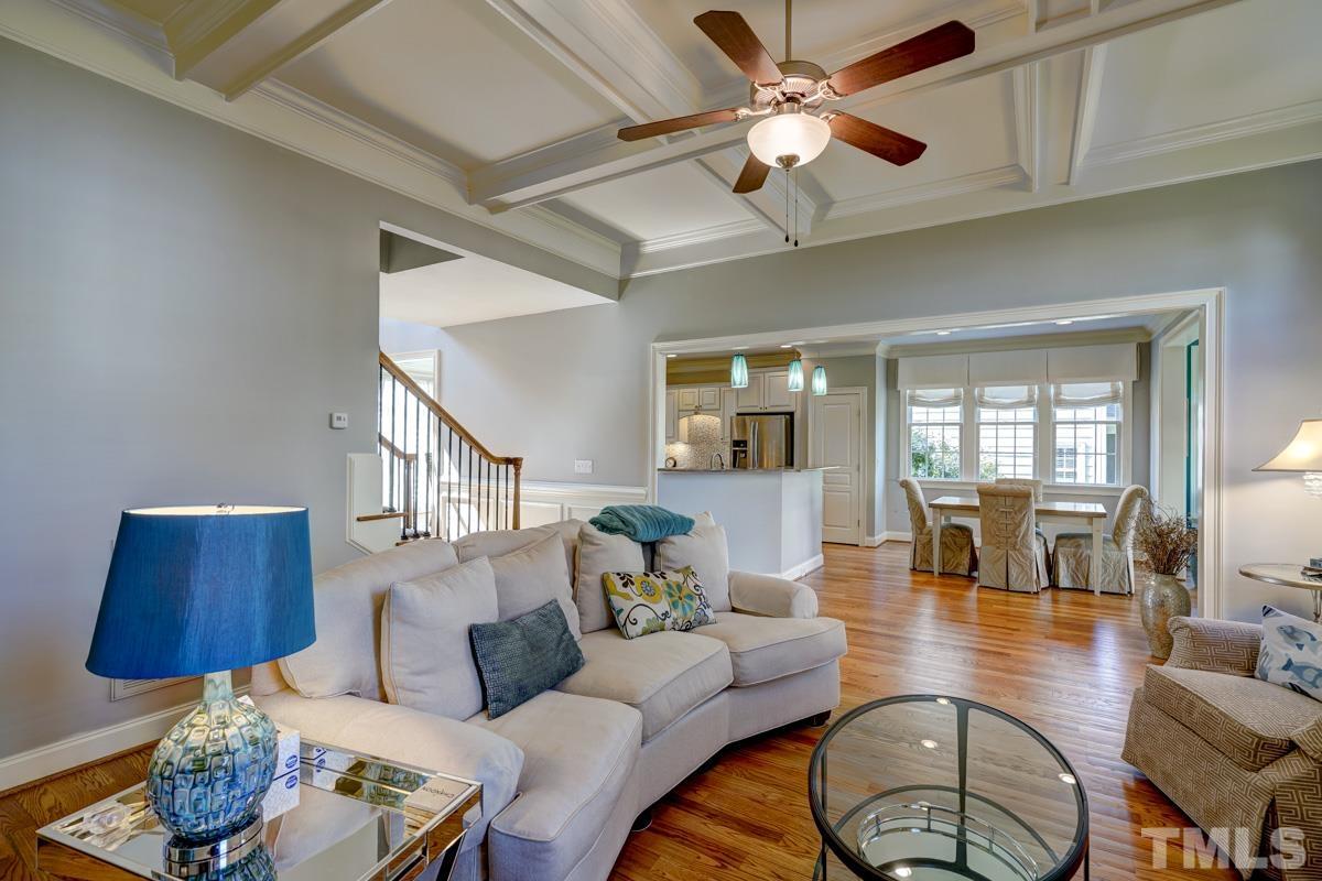 2724 Peachleaf Street Raleigh, NC 27614 - Photo 20 of 45 a living room with furniture or couch and a chandelier