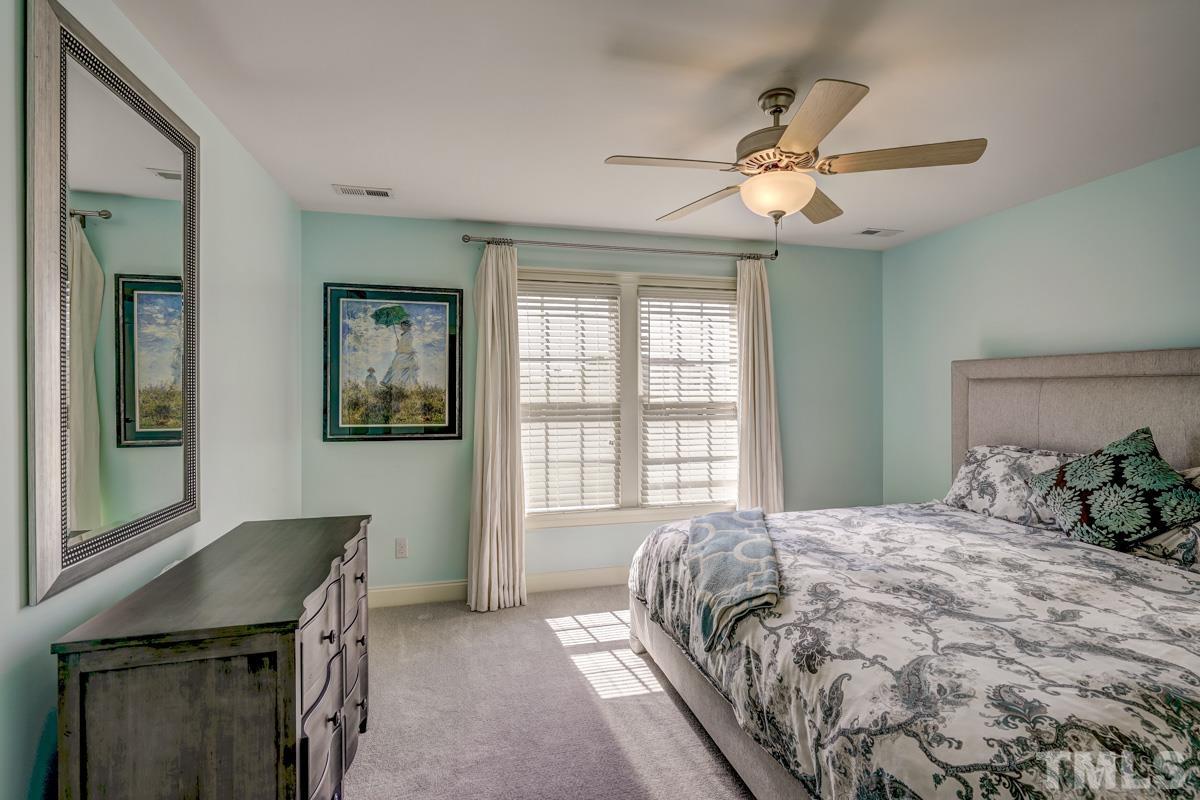 2724 Peachleaf Street Raleigh, NC 27614 - Photo 34 of 45 a bedroom with a bed and a window
